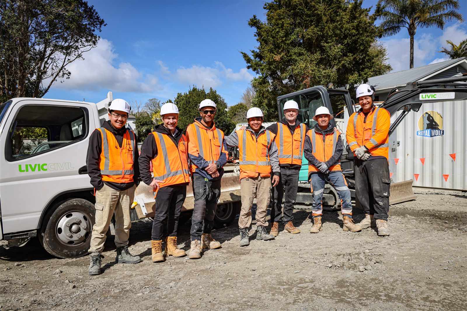 Livic Civil crew together beside site plant.