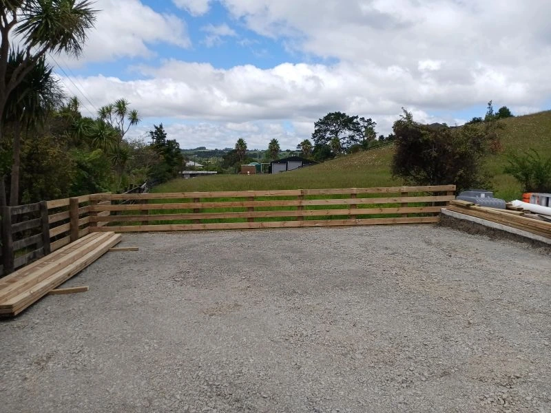 Prepared gravel platform during a controlled site work sequence.