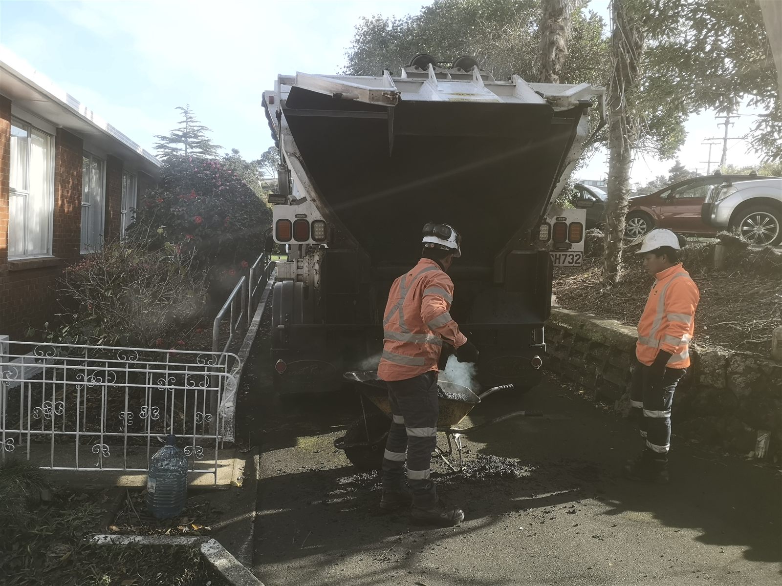 Livic crew working beside a truck during East Coast Bays drainage work.