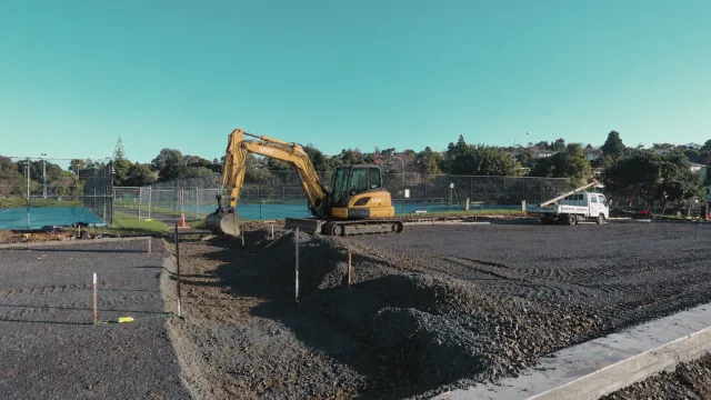 Livic Civil excavator completing detailed earthworks on a prepared site.