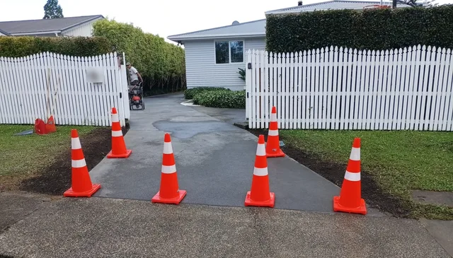 Reconstructed concrete driveway at the street entrance.