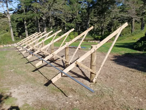 Foundations set out in rows for a solar farm.