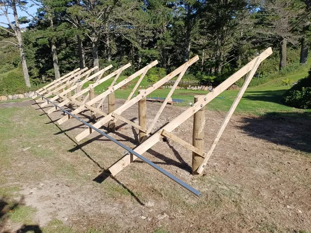 Foundations set out in rows for a solar farm.